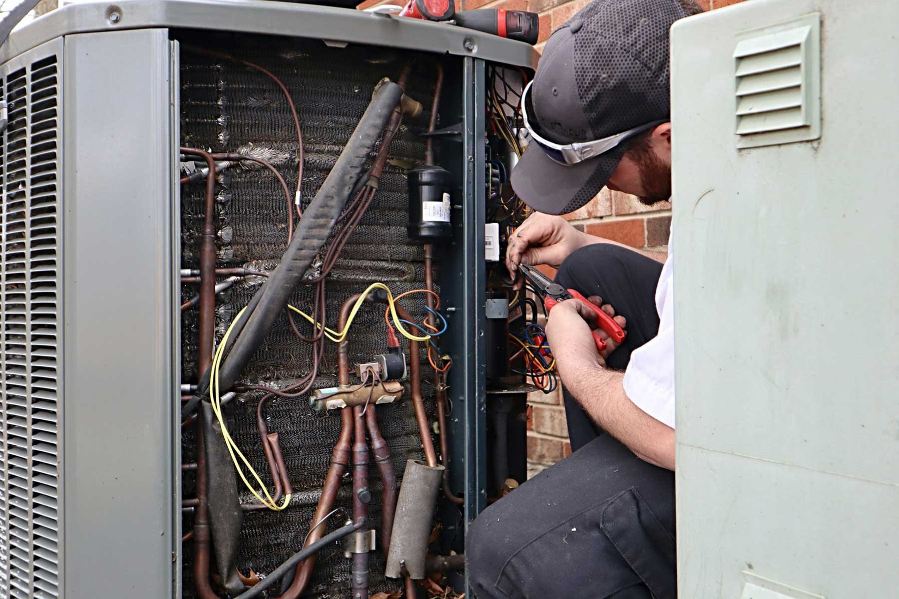 Ashworth Heating & Cooling air conditioning repairs background