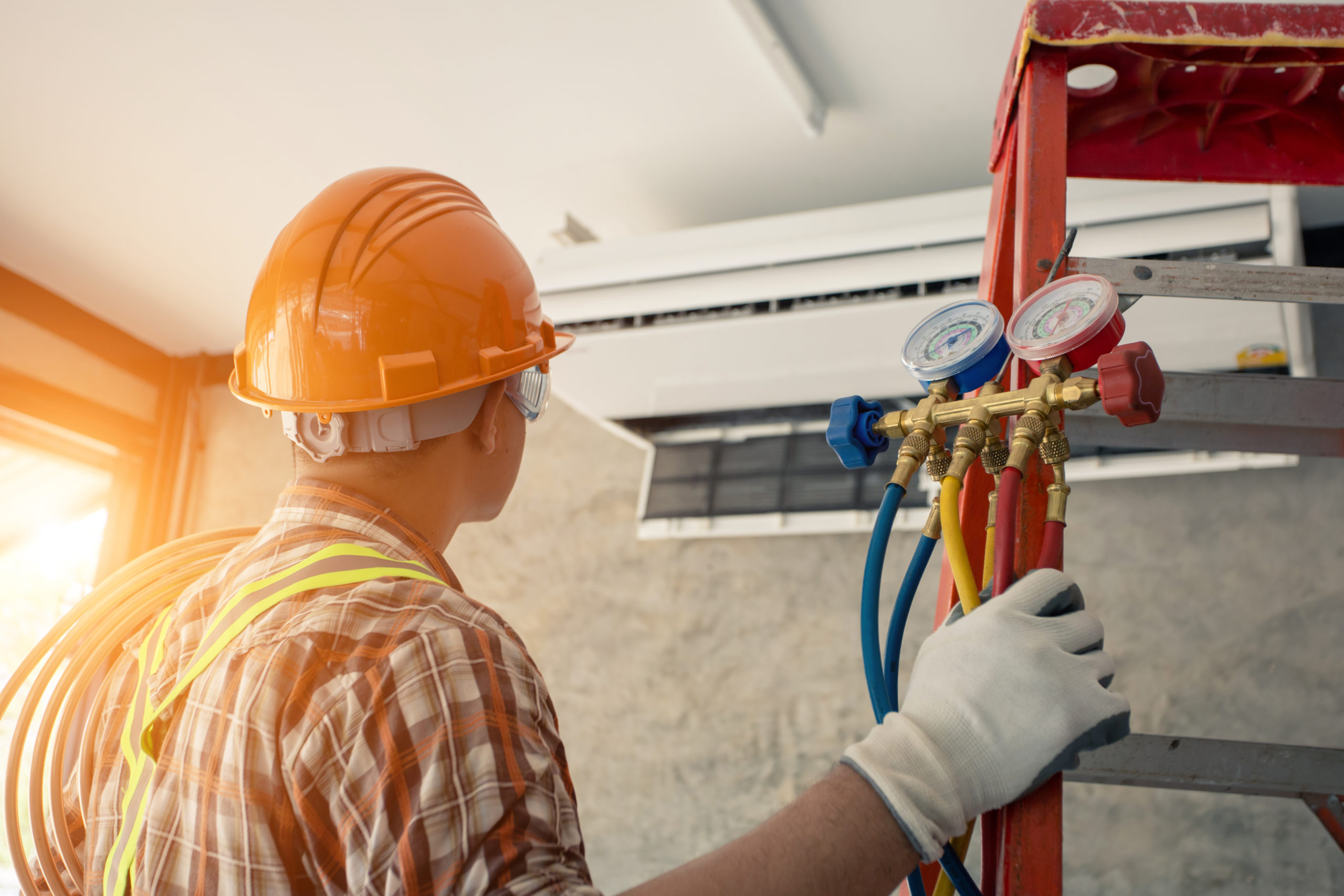 Ashworth Heating and Air Conditioning Technician and A part of preparing to install new air conditioner.